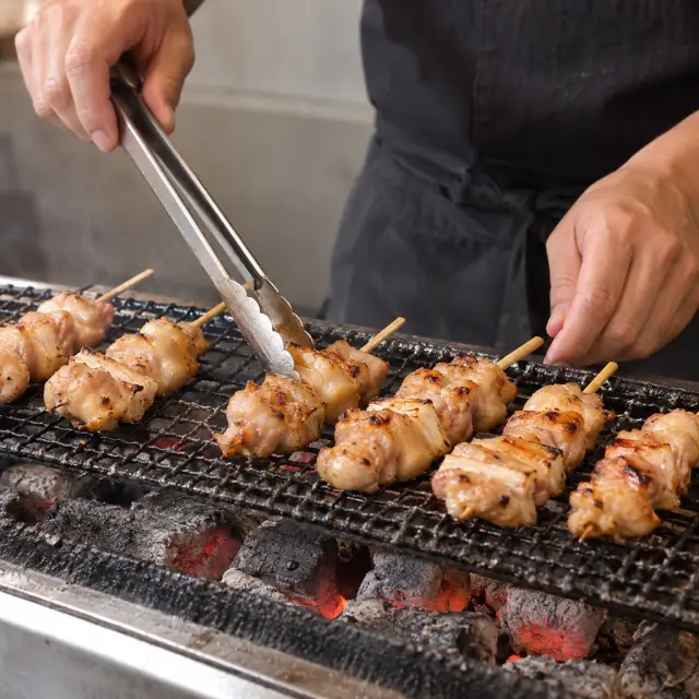 Skewers over charcoal